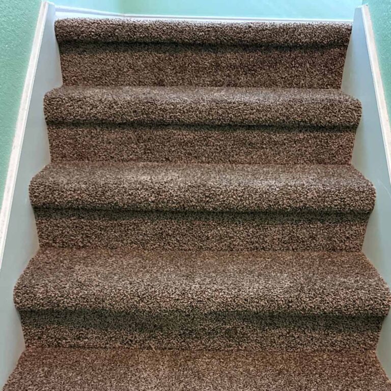 Dreamweaver SP250 carpet in the color Agate. Installed on staircase in Denton, Texas. By the experts at Flooring Direct.