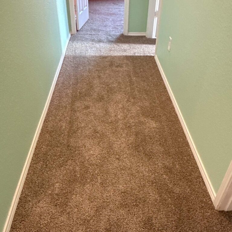 Carpet flooring installed through hallway in home of Denton, Texas. Dreamweaver SP250 in color of Agate.
