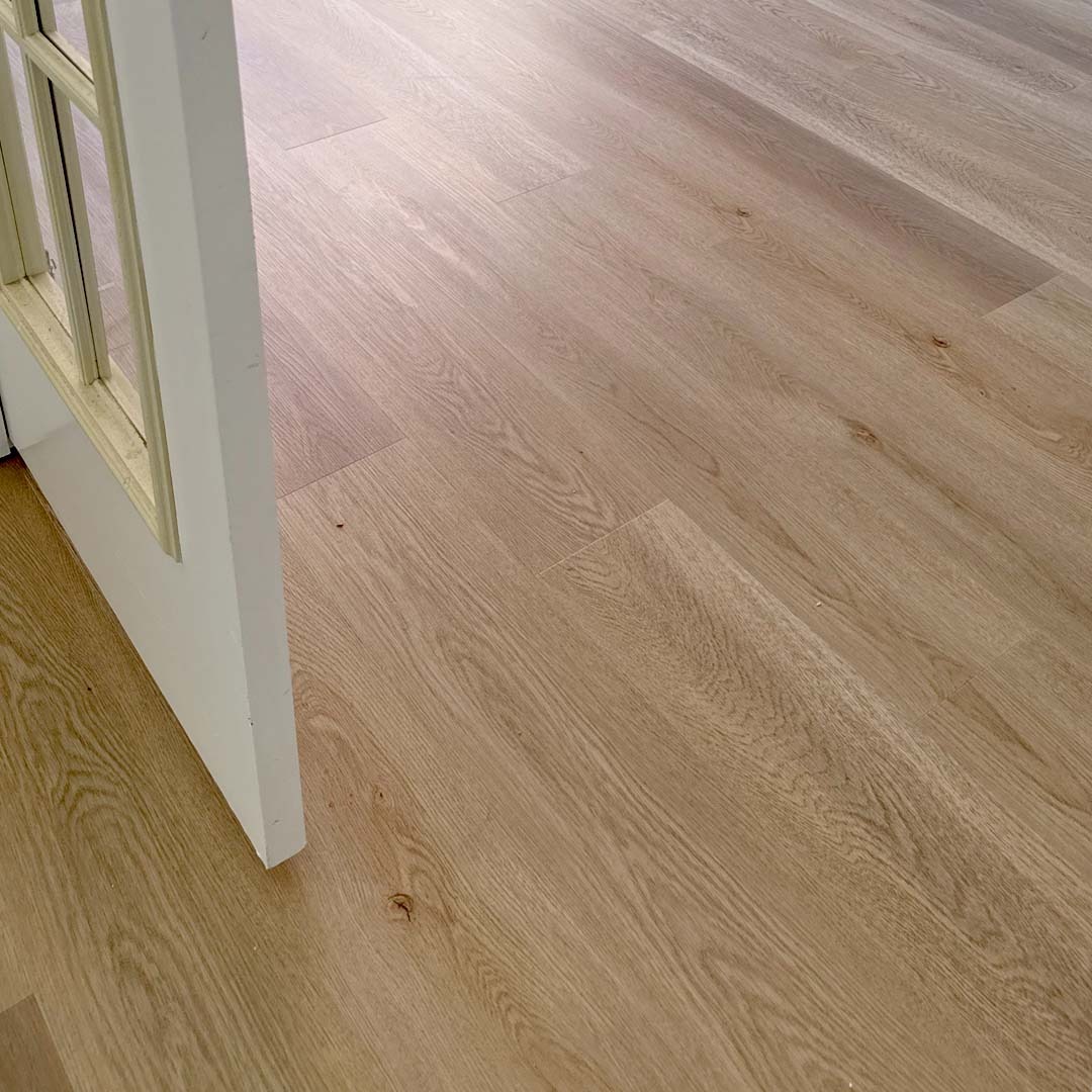 Green Touch Flooring's Aspen Collection SPC Wood-Look Flooring in the color Staten Island installed by the experts Flooring Direct DFW in Fort Worth, Texas