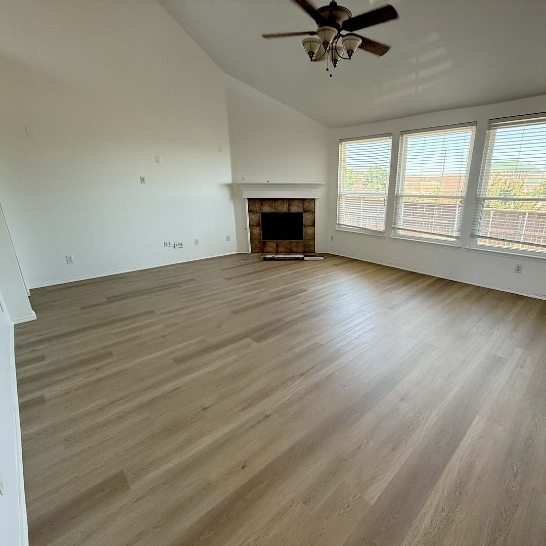 Green Touch Flooring's Aspen Collection SPC Wood-Look Flooring in the color Staten Island installed by the experts Flooring Direct DFW in Fort Worth, Texas